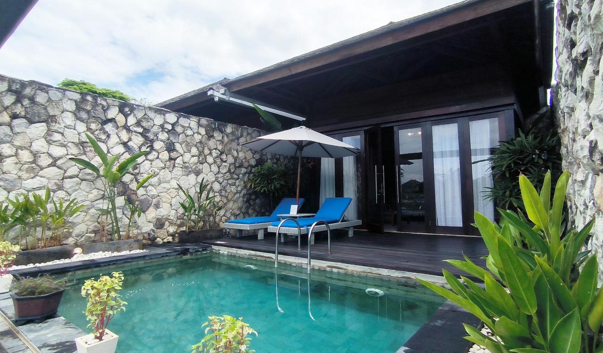 Wyndham Tamansari Jivva Resort Bali Siyut Exterior photo A pool villa at the resort